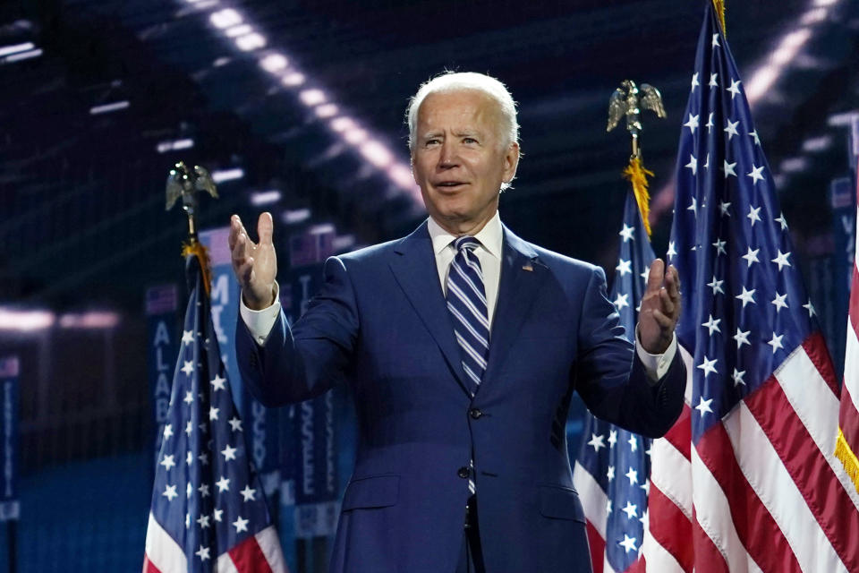 Democratic presidential candidate former Vice President Joe Biden stands on stage after Democratic vice presidential candidate Sen. Kamala Harris, D-Calif., spoke during the third day of the Democratic National Convention, Wednesday, Aug. 19, 2020, at the Chase Center in Wilmington, Del. (AP Photo/Carolyn Kaster)
