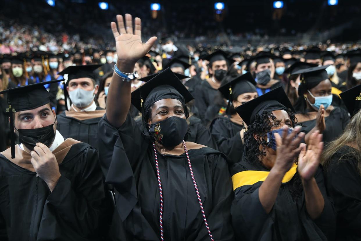 <span class="caption">The Pell Grant covers less than 30 percent of the costs to attend a four-year public college. </span> <span class="attribution"><a class="link " href="https://www.gettyimages.com/detail/news-photo/graduate-waives-during-the-53rd-commencements-of-the-news-photo/1234897146" rel="nofollow noopener" target="_blank" data-ylk="slk:Craig F. Walker/The Boston Globe via Getty Images;elm:context_link;itc:0;sec:content-canvas">Craig F. Walker/The Boston Globe via Getty Images</a></span>