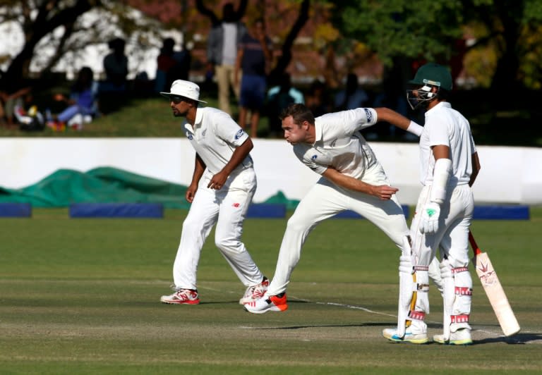 New Zealand bowler Tim Southee (C) in action during the third day of the first Test against hosts Zimbabwe in Bulawayo on July 30, 2016