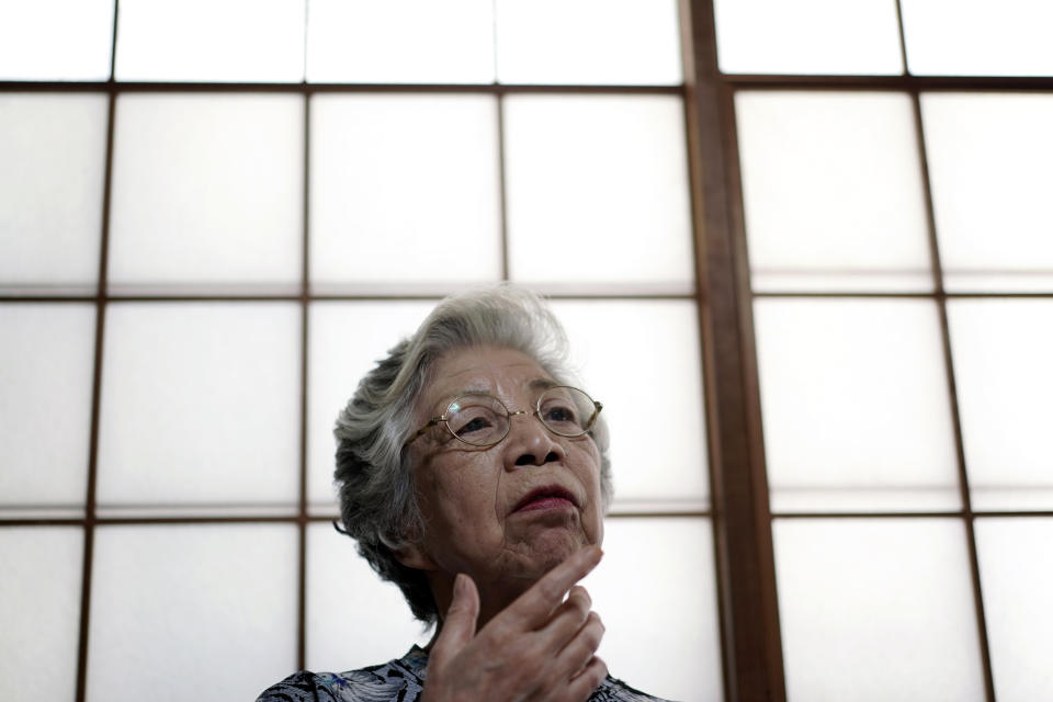 Mari Kaneda, 85, a WWII war orphan, speaks on her experience during an interview with The Associated Press Sunday, July 19, 2020, in Warabi, north of Tokyo. In Japan, war orphans were punished for surviving. They were bullied. They were called trash, sometimes rounded up by police and put in cages. Some were sent to institutions or sold for labor. They were targets of abuse and discrimination. Now, 75 years after the war's end, some are revealing their untold stories of recovery and pain, underscoring Japan’s failure to help its own people. (AP Photo/Eugene Hoshiko)