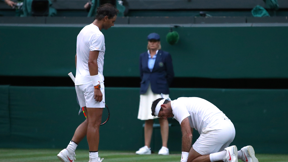 Rafael Nadal approaches Juan Martin del Potro at Wimbledon. Pic: Getty