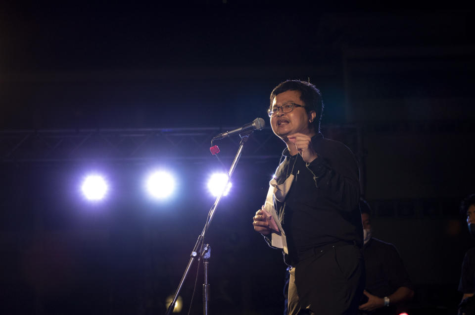 Pro-democracy activist and human rights lawyer Arnon Nampha delivers a speech during a protest rally at Democracy Monument in Bangkok, Thailand, Sunday, Aug. 16, 2020. Protesters have stepped up pressure on the government demanding to dissolve the parliament, hold new elections, amend the constitution and end intimidation of the government's opponents. (AP Photo/Gemunu Amarasinghe)