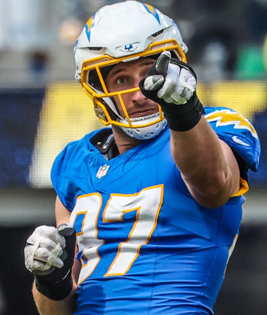 Chargers linebacker Joey Bosa (97) celebrates after sacking Raiders quarterback Gardner Minshew (15).