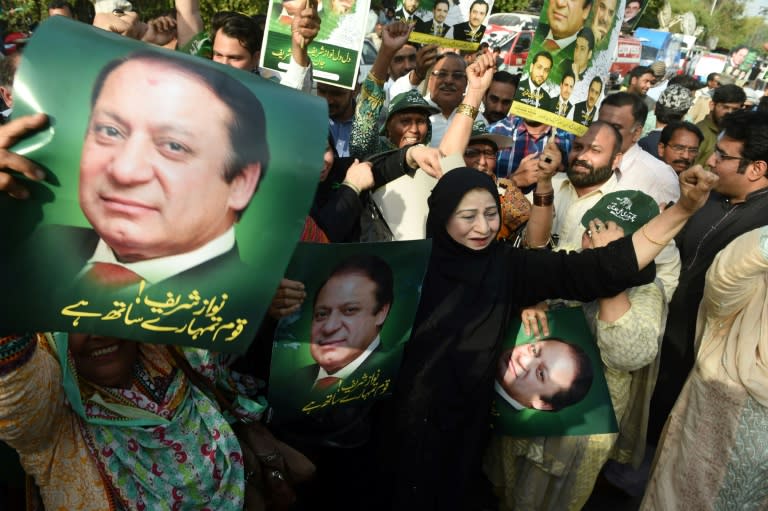 Government supporters could be seen celebrating the judgement with sweets outside the court in Islamabad, where around 1,500 police commandos and riot forces had been deployed ahead of the highly anticipated decision. 