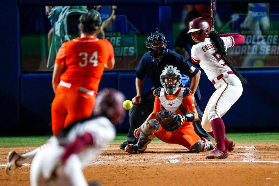 Oklahoma State pitcher Kyra Aycock (34) pitches to Florida State's Michaela Edenfield (51) in the third inning Thursday night at USA Softball Hall of Fame Stadium.