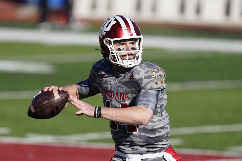 Indiana quarterback Jack Tuttle (14) throws during the second half of an NCAA college football game against Maryland, Saturday, Nov. 28, 2020, in Bloomington, Ind. Indiana won 27-11. (AP Photo/Darron Cummings)
