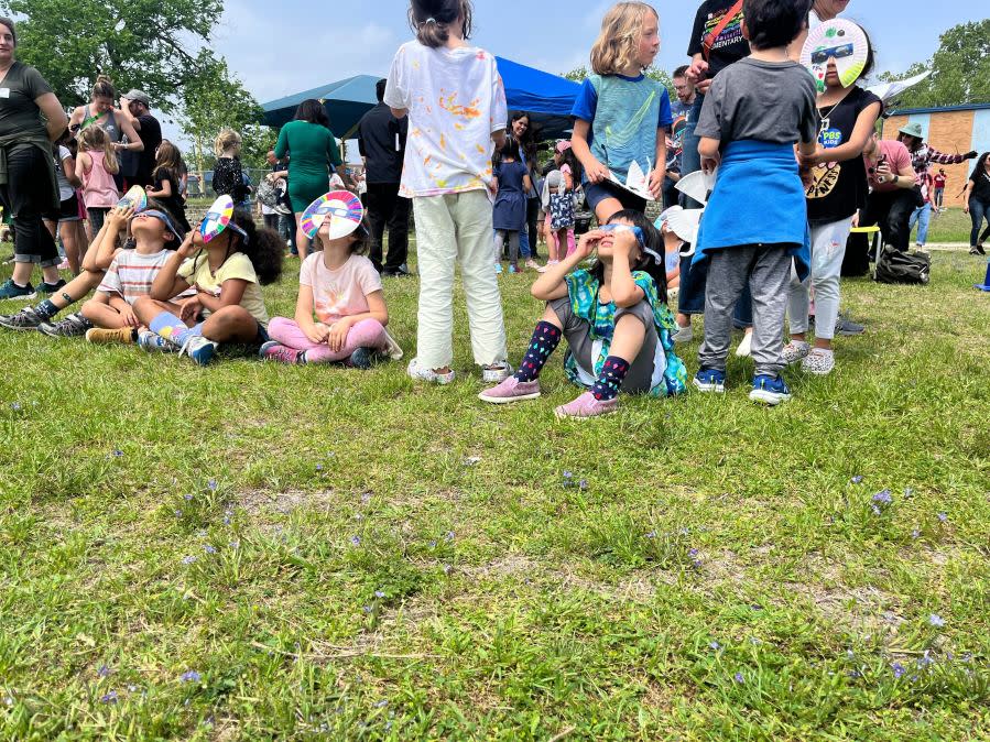 Kids at Reilly Elementary School in Austin, Texas, watch the total solar eclipse. (KXAN Photo/Kelly Wiley)