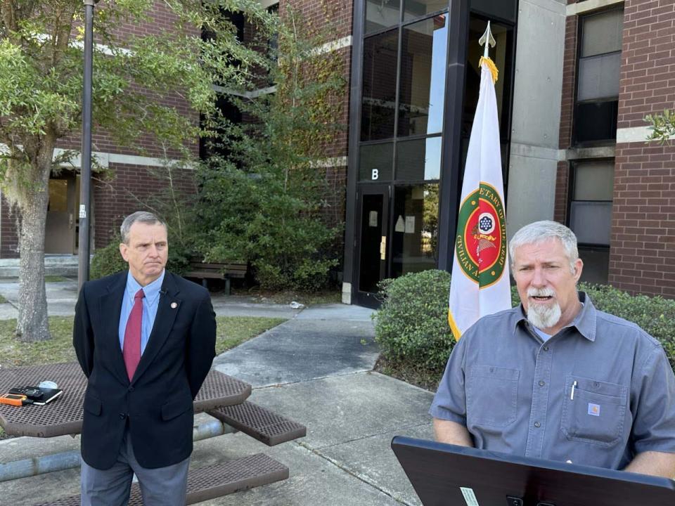 Bill McGovern tech engineer with directorate of public works and lead on the mold team, Fort Stewart discusses the mold problem plaguing Fort Stewart single solders living spaces in the Barracks as Peter Hoffman, Civilian aide to the Secretary of the Army, looks on during a press conference.