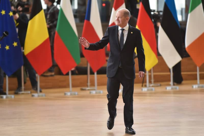 German Chancellor Olaf Scholz arrives to attend a European Council meeting at the European headquarters in Brussels. Gaetan Claessens/European Council/dpa