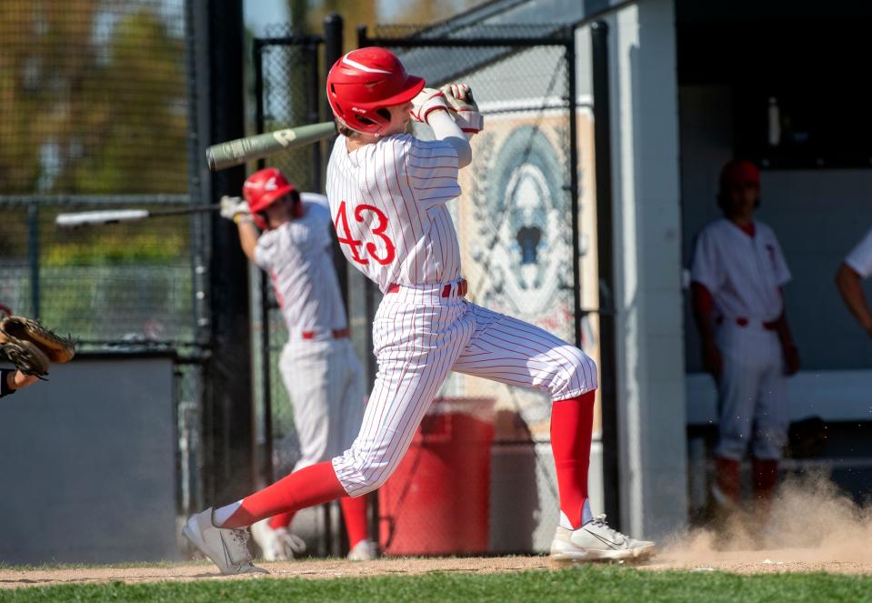 Lincoln's Brayden Abdon hits a double during a varsity baseball game against Tokay at Lincoln in Stockton on Wednesday, Apr.19, 2023.