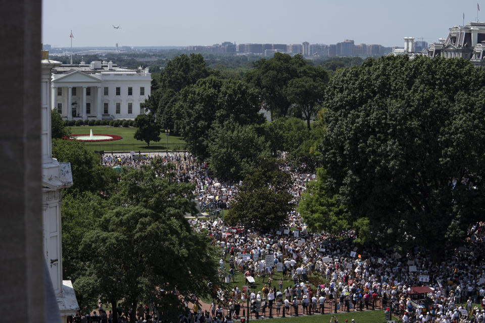 Demonstrators gather outside the White House in Washington, D.C., during a protest against the Trump administration's policy on separating immigrant families. (Photo: Bloomberg via Getty Images)