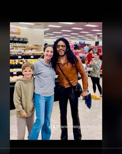 In this photo taken over the weekend, Danielle Fatigate and her 9-year-old son Maxim poses with rocker Lenny Kravitz at the Daytona Beach Buc-ee's on Saturday, March 23, 2024. Kravitz was greeted with hugs and selfies as he made his way through the store.