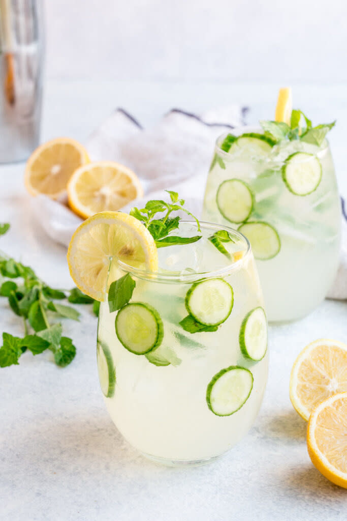 A glass of cucumber vodka lemonade.