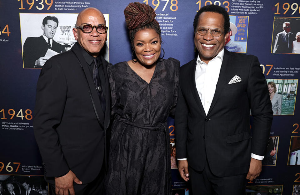 Musical director Rickey Minor, longtime MPTF champion Yvette Nicole Brown and Donray Von. (Not pictured: The show was executive produced by Juliane Hare and Charlie Haykel of Don Mischer Prods. with John Foy as producer.) Said Brown: “I just love what they do. I wish more people knew everything that MPTF does and I wish that people could see beyond their current circumstances to realize that they may be doing well now, but one day it may change. If you put money in the pot now, when it’s your turn, the money’s there for you.” - Credit: Courtesy of Shutterstock for MPTF