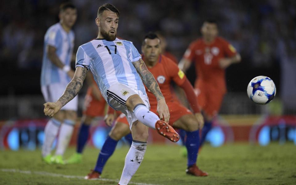 Argentina's Nicolas Otamendi shoots during their win against Chile - Credit: AFP