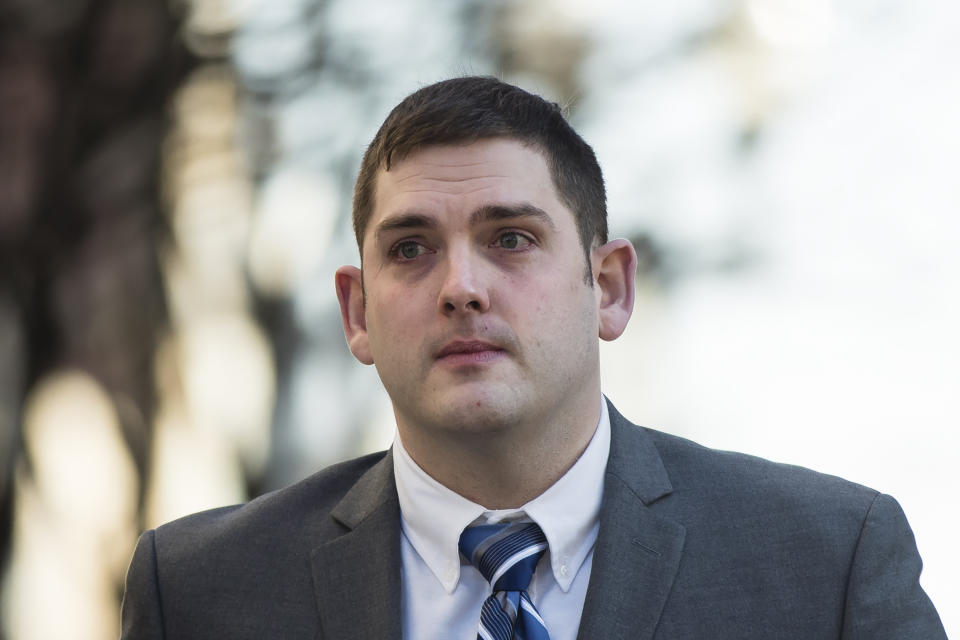 In this March 12, 2019 file photo, former East Pittsburgh police officer Michael Rosfeld, charged with homicide in the shooting death of Antwon Rose II, walks to the Dauphin County Courthouse in Harrisburg, Pa. On the fourth day of trial in Pittsburgh, Rosfeld was acquitted Friday March 22, 2019 of all counts in the death of Rose. (AP Photo/Matt Rourke)