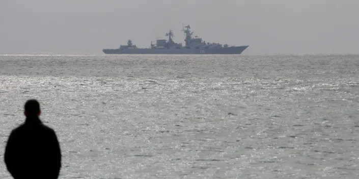 The Russian warship &quot;Moskva&quot; (&quot;Moscow&quot;), a Slava class guided missile cruiser, off the Black Sea shore in 2014.