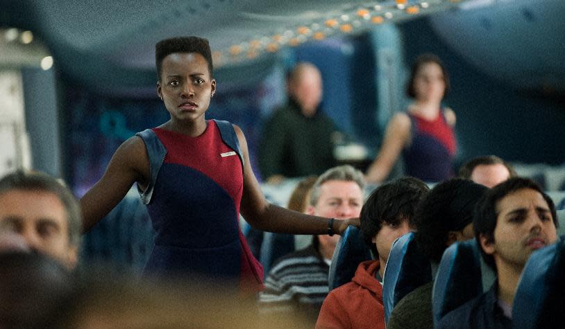 This image released by Universal Pictures shows Lupita Nyong'o in a scene from "Non-Stop." (AP Photo/Universal Pictures, Myles Aronowitz)