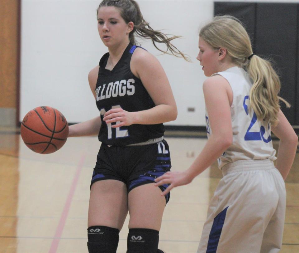 Sophomore Chloe Robinson (left) and the Inland Lakes girls can reach the regional final for a second consecutive year if they defeat St. Ignace at Harbor Light on Monday.