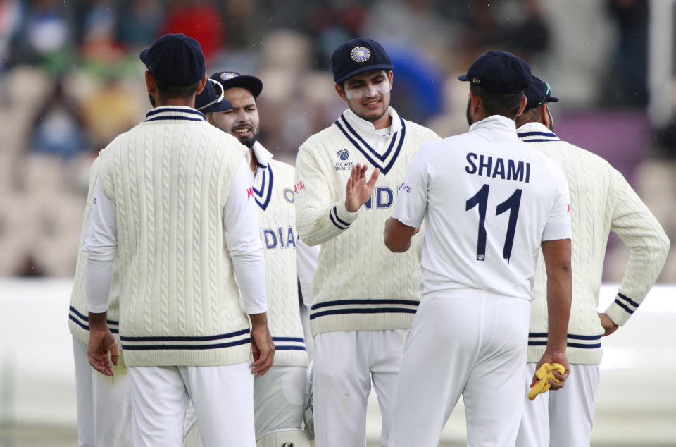 Indian players get together during the third day of the World Test Championship final cricket match between New Zealand and India, at the Rose Bowl in Southampton, England, Sunday, June 20, 2021. (AP Photo/Ian Walton)