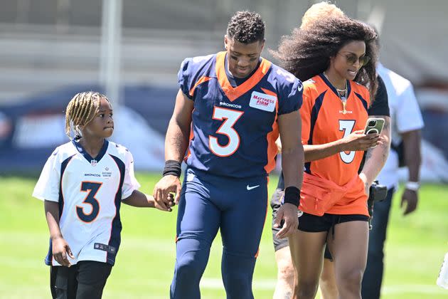 ENGLEWOOD , CO - JULY 27: Denver Broncos quarterback Russell Wilson (3) walks off the field with his son, Future, and wife, Ciara, during training camp at UCHealth Training Center. (Photo: Photo by AAron Ontiveroz/MediaNews Group/The Denver Post via Getty Images)