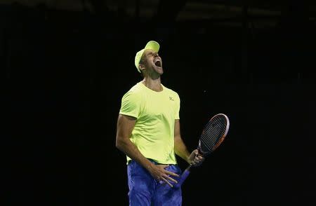 Tennis - Australian Open - Melbourne Park, Melbourne, Australia - 17/1/17 Croatia's Ivo Karlovic celebrates winning match point in his Men's singles first round match against Argentina's Horacio Zeballos. REUTERS/Thomas Peter