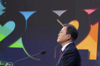 South Korean President Moon Jae-in speaks during an on-line New Year press conference with local and foreign journalists at the Presidential Blue House in Seoul, South Korea Monday, Jan. 18, 2021. (Jeon Heon-kyun/Pool Photo via AP)