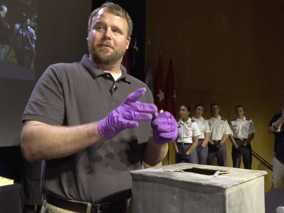 image of official opening lead box with gloves