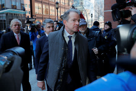 Gordon Ernst, Georgetown University's former head tennis coach facing charges in a nationwide college admissions cheating scheme, arrives at the federal courthouse in Boston, Massachusetts, U.S., March 25, 2019. REUTERS/Brian Snyder