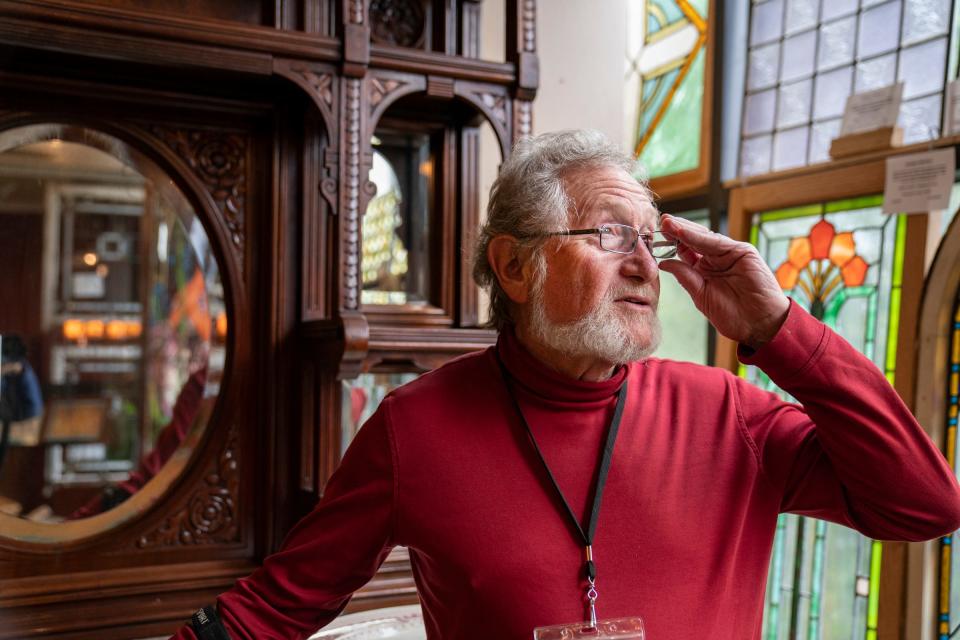 Reynold Lowe, founder and "big cheese" of Materials Unlimited Antiques in his shop on Sept. 28, 2022, will be closing the Ypsilanti store this winter.