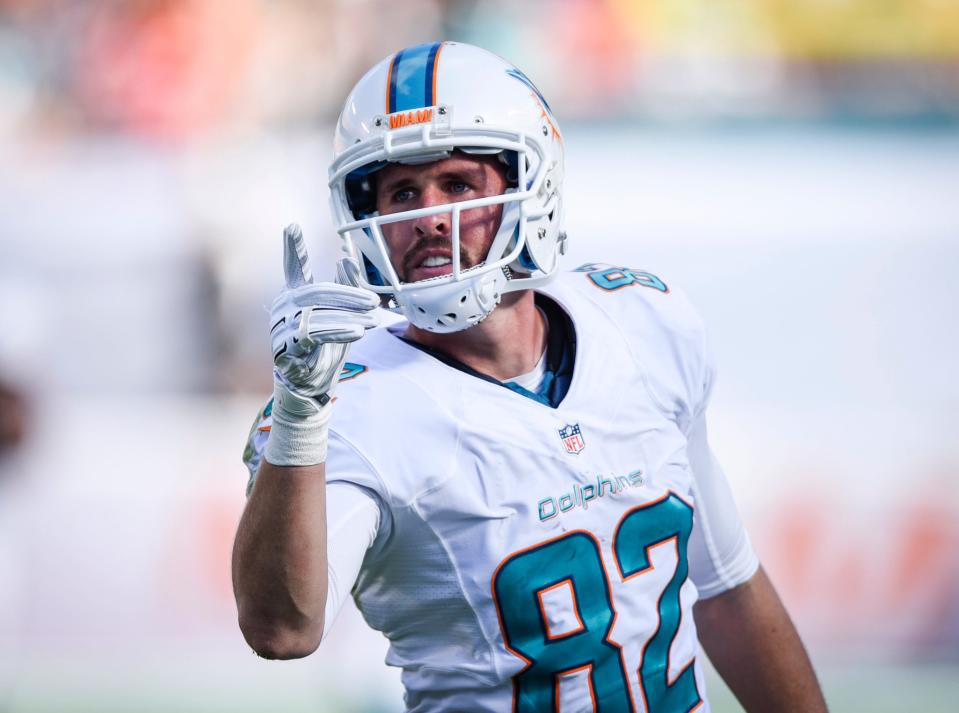 Miami Dolphins wide receiver Brian Hartline (82) celebrates his catch against the New York Jets in the second half at Sun Life Stadium.