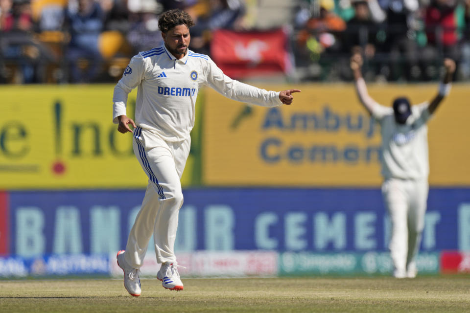 India's Kuldeep Yadav celebrates the wicket of England's Jonny Bairstow on the third day of the fifth and final test match between England and India in Dharamshala, India, Saturday, March 9, 2024. (AP Photo /Ashwini Bhatia)