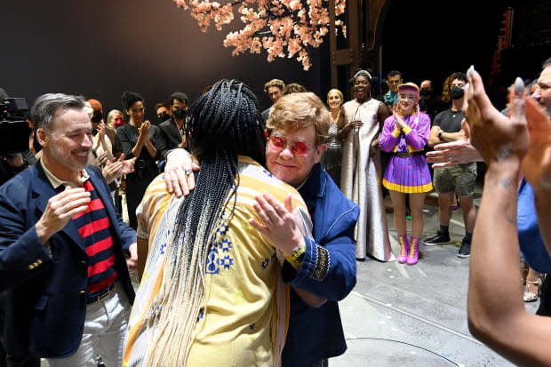 Elton John embraces choreographer James Alsop.<p>Photo by Daniel Boczarski/Getty Images for The Devil Wears Prada, The Musical</p>