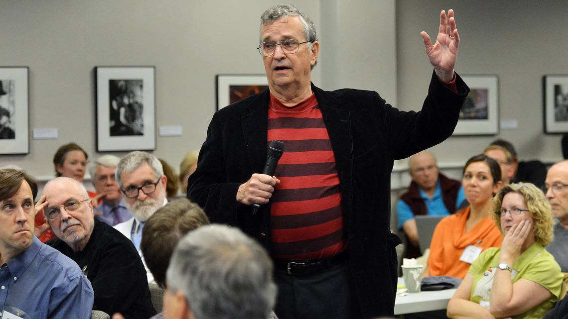 UNC professor Hodding Carter III speaks passionately during the Faculty Council meeting at Chapel Hill, NC Friday, October 31, 2014.