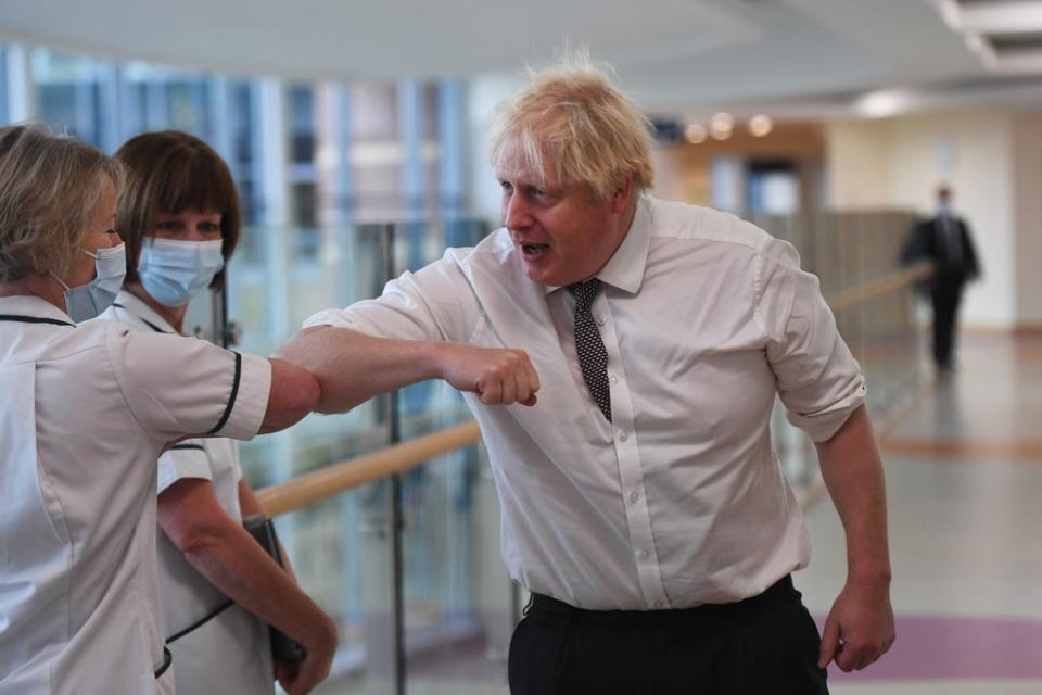 Prime Minister Boris Johnson has been criticised for not wearing a face covering at all times during his visit to Hexham General Hospital (Peter Summers/PA) (PA Wire)