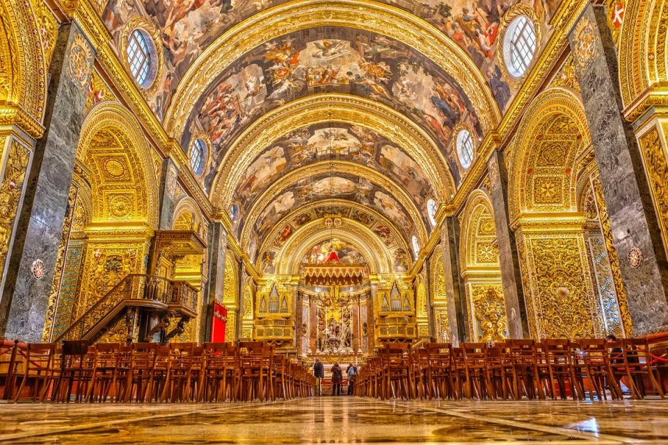 The Baroque building is laden with tapestries, chapels and a series of tombs accented with gold (Getty Images)