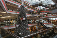 A Christmas tree is displayed at a shopping mall as the territory prepares to celebrate the Christmas holidays, in Hong Kong Monday, Nov. 26, 2012. (AP Photo/Vincent Yu)