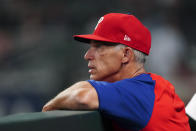 Philadelphia Phillies manager Joe Girardi looks on from the dugout during the seventh inning of a baseball game against the Atlanta Braves, Monday, May 23, 2022, in Atlanta. (AP Photo/John Bazemore)