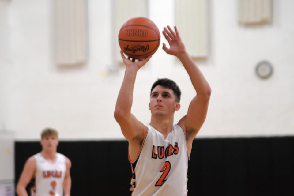 Lucas senior Logan Toms scored his 1,000th career point in a 50-45 win over Mohawk on Saturday becoming just the ninth player in Lucas boys basketball history to do so.