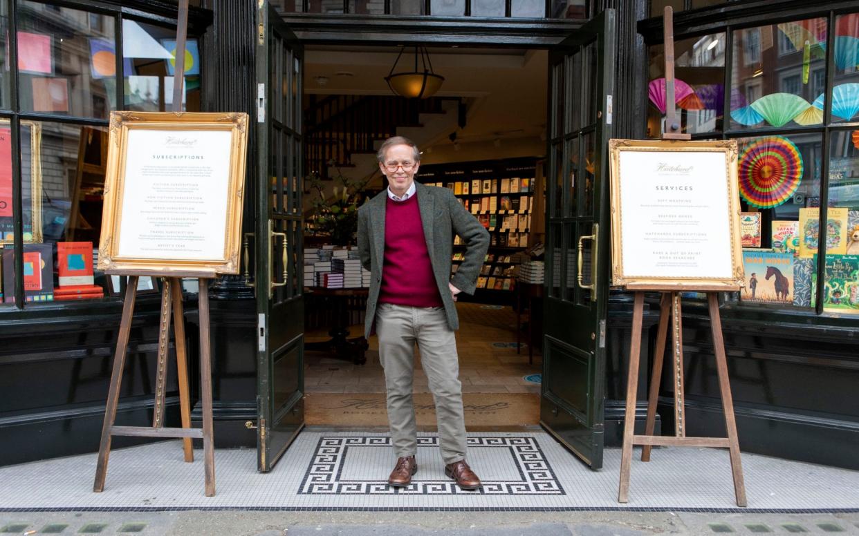 General Manager Francis Cleverdon at the entrance door of Hatchards, London's oldest book shop, Piccadilly, London - Rii Schroer 