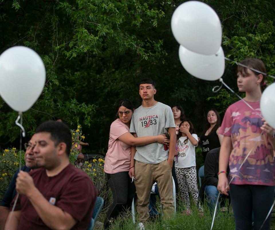 Family and friends mourn the loss of 39-year-old Christina Michelle Limon and her son, 14-year-old Rudy Xavier Limon-Lirra during the memorial service in the east Austin Garden View Drive neighborhood on Friday, April 29, 2022. 