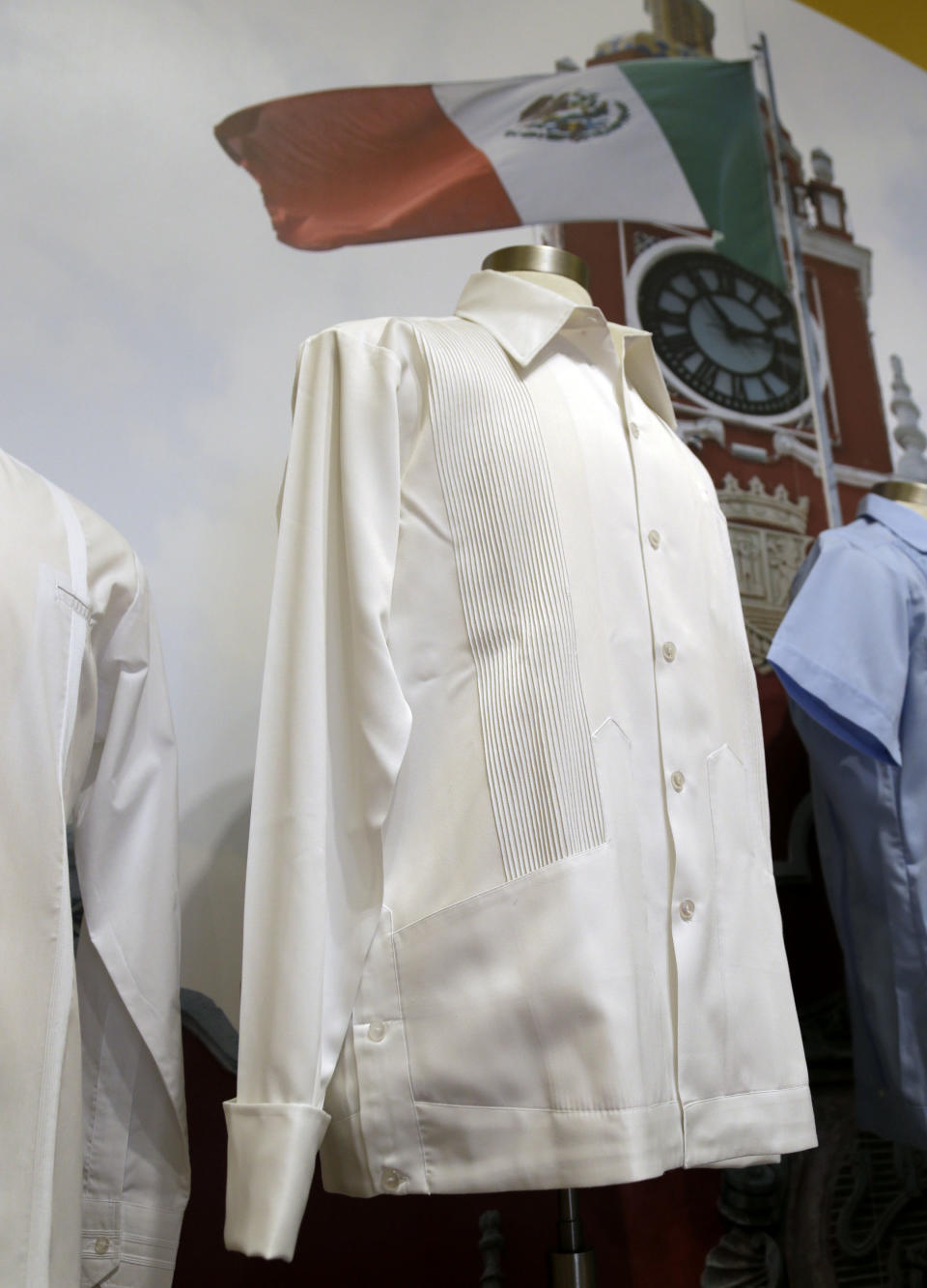 In this Wednesday, Oct. 17, 2012 photo, a guayabera from the 1970s in Mexico worn by then-president Luis Echevarria is on display at an exhibition titled "The Guayabera: A Shirt's Story" at the Museum of History Miami, in Miami. This is the first exhibition to trace the story of the shirt's evolution through Cuba, Mexico, and the United States. (AP Photo/Lynne Sladky)