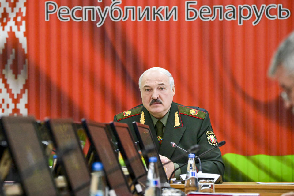 Belarusian President Alexander Lukashenko attends a meeting with top level military officials in Minsk, Belarus, Monday, Nov. 22, 2021. (Andrei Stasevich/BelTA Pool Photo via AP)