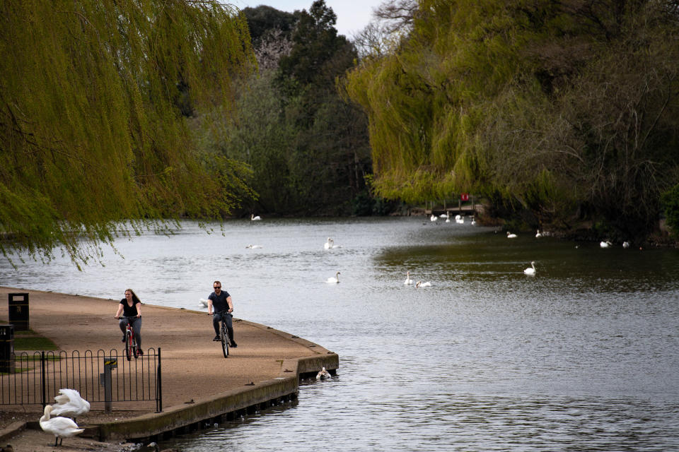 Cyclists by the river Avon in a near-deserted Stratford-upon-Avon in Warwickshire, as the UK continues in lockdown to help curb the spread of the coronavirus.