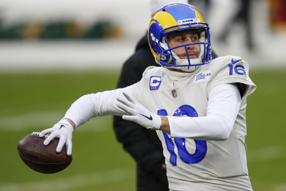 Los Angeles Rams quarterback Jared Goff warms up before an NFL divisional playoff football game against the Green Bay Packers, Saturday, Jan. 16, 2021, in Green Bay, Wis. (AP Photo/Matt Ludtke)