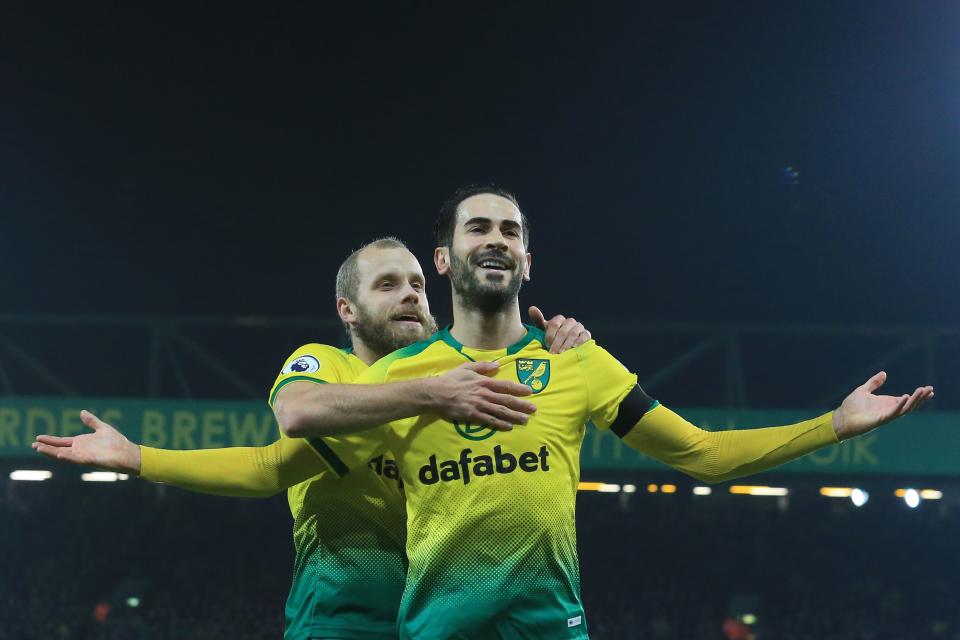 Norwich City's Bosnian midfielder Mario Vrancic celebrates scoring the opening goal with Finnish striker Teemu Pukki. (Photo by LINDSEY PARNABY/AFP via Getty Images)