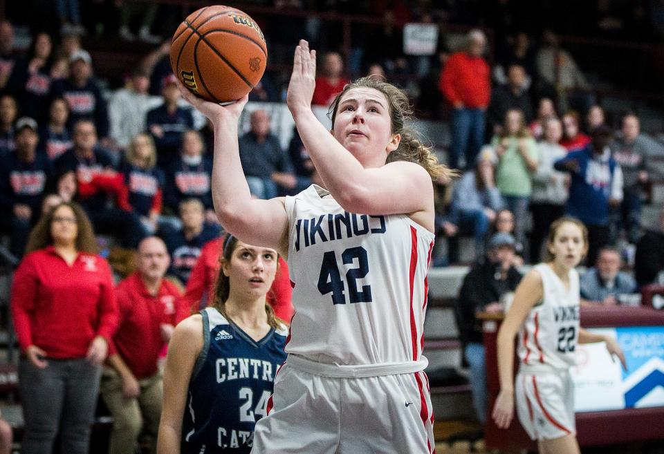 Blue River's Ally Madden shoots past Central Catholic in their regional game at Wes-Del High School Saturday, Feb. 12, 2022. 