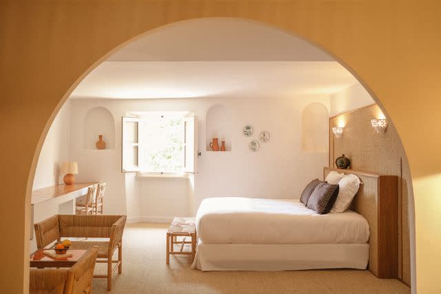 <p>Courtesy of Le Moulin</p> Rooms at Le Moulin are done in colors like sisal yellow and ochre red, to represent hues seen in local quarries.