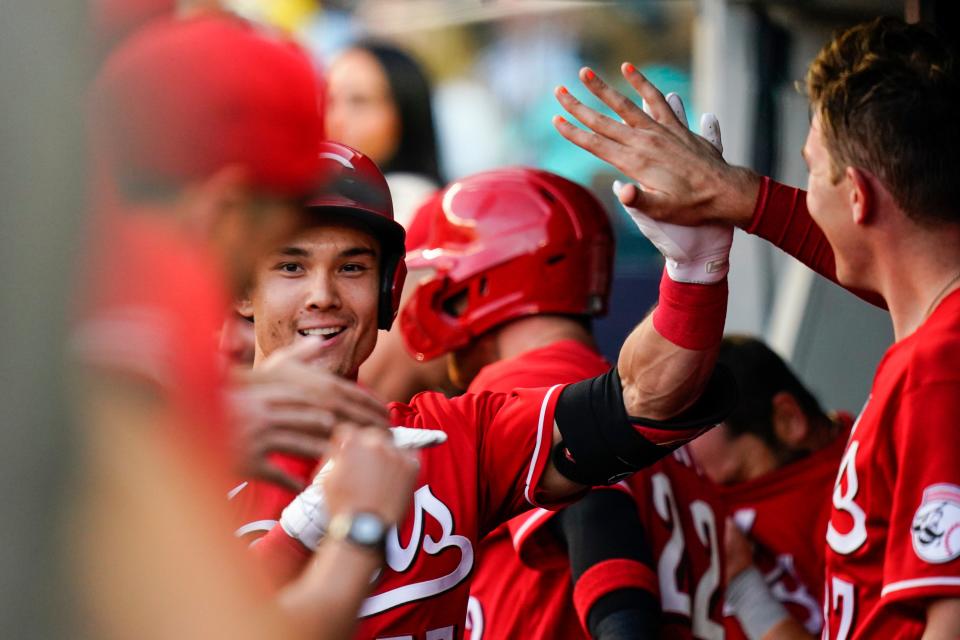 Cincinnati Reds' Stuart Fairchild celebrates with teammates after hitting a home run against the New York Yankees during the second inning of a baseball game Wednesday, July 13, 2022, in New York.