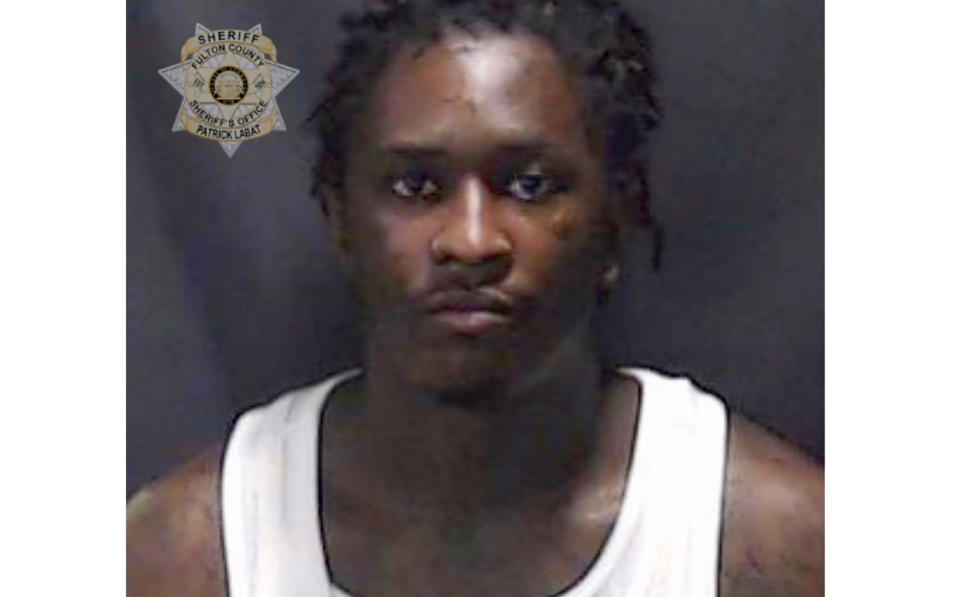 CORRECT FIRST NAME TO: JEFFERY, INSTEAD OF JEFFREY This booking photo provided by Fulton County Sheriff’s Office shows a booking photo of Atlanta rapper Young Thug. The Atlanta rapper, whose name is Jeffery Lamar Williams, was one of 28 people indicted Monday, May 9, 2022, in Georgia on conspiracy to violate the state's RICO act and street gang charges, according to jail records. (Fulton County Sheriff’s Office via AP)